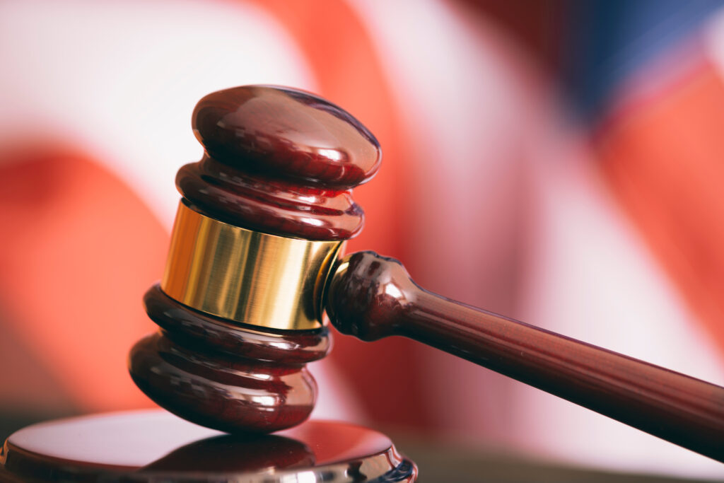 Gavel and american flag, symbol for jurisdiction , selective focus