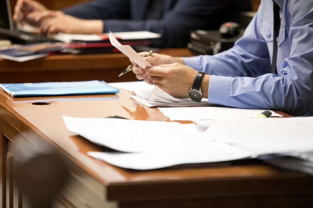 Close up of the lawyers' tables in a courtroom.